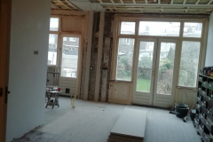 Doorbraak met stalen portaal weggewerkt tussen de plafond
